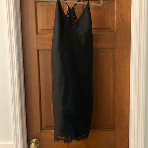 Brand new with tags Lulu’s black fitted dress.